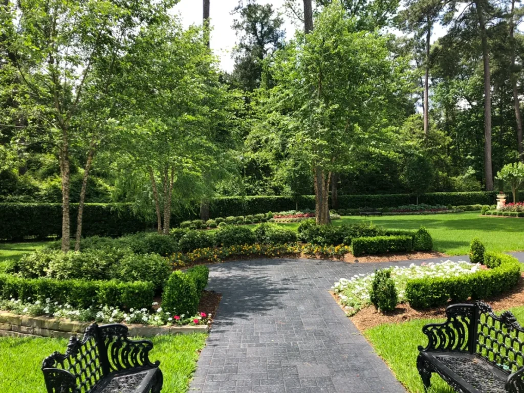 Professionally designed garden and paver walkway at a high-end residential property