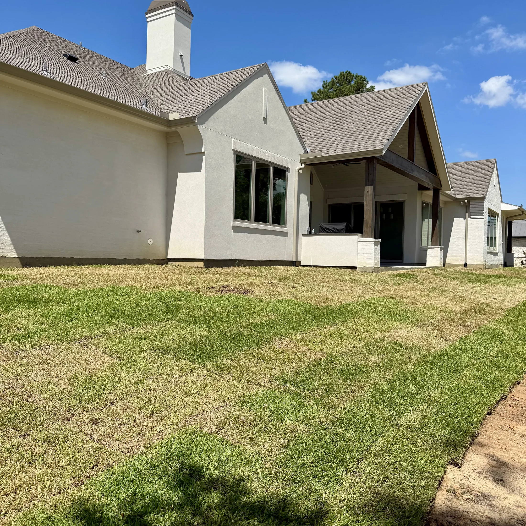 Jeff Paul custom home completed side yard landscaping